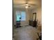 Empty bedroom features a large window, dresser, and a cat tree at 1114 N Olney St, Indianapolis, IN 46201