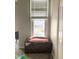 Cozy bedroom nook with window seat and natural light at 1114 N Olney St, Indianapolis, IN 46201