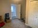 Bedroom with closet features neutral colored walls and soft carpet at 1114 N Olney St, Indianapolis, IN 46201