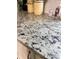 Close-up of a granite countertop showing texture and pattern details at 1114 N Olney St, Indianapolis, IN 46201