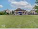 Large backyard with pool and plenty of space for outdoor activities at 11521 Willow Bend Dr, Zionsville, IN 46077