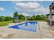 Inviting backyard pool with slide, perfect for summer fun and relaxation at 11521 Willow Bend Dr, Zionsville, IN 46077