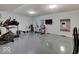 Basement gym featuring workout equipment and multiple mirrors at 11521 Willow Bend Dr, Zionsville, IN 46077