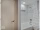 Bathroom showcasing bathtub and shower with bright white tile at 11521 Willow Bend Dr, Zionsville, IN 46077