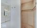 Bathroom with a tiled shower, vanity, and linen closet at 11521 Willow Bend Dr, Zionsville, IN 46077