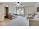 Bright bedroom with neutral carpet, two lounge chairs and a window at 11521 Willow Bend Dr, Zionsville, IN 46077