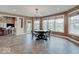 Open concept dining room with natural light and view of backyard at 11521 Willow Bend Dr, Zionsville, IN 46077