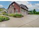 A three car garage and manicured landscaping add to the beauty of this home at 11521 Willow Bend Dr, Zionsville, IN 46077