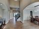 Welcoming foyer with hardwood floors and access to dining and living spaces at 11521 Willow Bend Dr, Zionsville, IN 46077