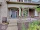 Inviting front entrance with flowering plants and a decorative wreath at 11521 Willow Bend Dr, Zionsville, IN 46077