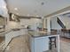 Spacious kitchen with stainless steel appliances, large island, and tile floors at 11521 Willow Bend Dr, Zionsville, IN 46077