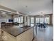 Open kitchen with a spacious island, modern appliances, and seamless flow to adjacent living spaces at 11521 Willow Bend Dr, Zionsville, IN 46077