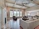 Spacious living room with coffered ceilings, fireplace, and an open layout, perfect for entertaining at 11521 Willow Bend Dr, Zionsville, IN 46077