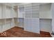 Walk-in closet with custom shelving and ample storage space at 11521 Willow Bend Dr, Zionsville, IN 46077