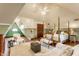 Charming bedroom with vaulted ceilings, hardwood floors, and a four-poster bed at 11705 N Shelby 700 W, New Palestine, IN 46163