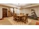 Basement dining room features a table, seating for eight, and an exercise area at 11705 N Shelby 700 W, New Palestine, IN 46163
