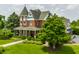 Charming Victorian home on a lush lot featuring a wraparound porch at 11705 N Shelby 700 W, New Palestine, IN 46163