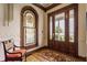 Foyer featuring hardwood floors, stained glass window, and a classic rug at 11705 N Shelby 700 W, New Palestine, IN 46163