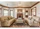 Spacious living room with hardwood floors, fireplace, and plenty of natural light creating an inviting atmosphere at 11705 N Shelby 700 W, New Palestine, IN 46163