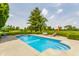 Relax by the sparkling in-ground pool with a tanning ledge and ample seating areas for entertaining at 11705 N Shelby 700 W, New Palestine, IN 46163