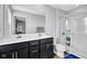 Bathroom with a double sink vanity, a glass enclosed shower, and neutral finishes at 13887 N Hawkers Hill Dr, Camby, IN 46113
