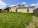 Spacious backyard with a well-maintained lawn, a fence, and plenty of room for outdoor activities at 1464 Scarlett Ct, Franklin, IN 46131