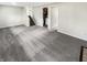 Spacious basement area with gray carpet and access to stairs at 1464 Scarlett Ct, Franklin, IN 46131