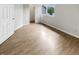 Bedroom features wood floors with two doors and one window at 1464 Scarlett Ct, Franklin, IN 46131