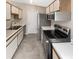 Well-equipped kitchen with modern appliances, ample counter space, and functional design at 1464 Scarlett Ct, Franklin, IN 46131