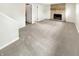 Cozy living room featuring a brick fireplace, mantle and neutral carpet at 1464 Scarlett Ct, Franklin, IN 46131