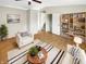 Inviting living room featuring hardwood floors, lots of natural light, and stylish furniture at 1464 Scarlett Ct, Franklin, IN 46131