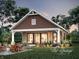 Charming home with a covered porch, manicured lawn, and an inviting outdoor seating area at 14866 E Keenan Cir # Lot 38, Westfield, IN 46074