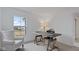Bright office space featuring a window, comfortable chair, and stylish work area at 14866 E Keenan Cir # Lot 38, Westfield, IN 46074