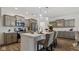 Modern kitchen with stainless steel appliances, an island with counter seating, and stylish pendant lighting at 14866 E Keenan Cir # Lot 38, Westfield, IN 46074
