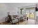 Inviting living room bathed in natural light with a fireplace, comfortable seating, and backyard views at 14866 E Keenan Cir # Lot 38, Westfield, IN 46074