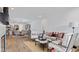 Bright living room with an open floor plan, seamlessly connecting to the dining area and kitchen at 14866 E Keenan Cir # Lot 38, Westfield, IN 46074