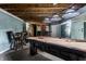 Finished basement space showcasing a pool table and a stylish bar area at 16126 Etna Green, Westfield, IN 46074