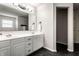 Bright bathroom with double sink vanity, ample storage, large mirror, and modern fixtures at 16126 Etna Green, Westfield, IN 46074