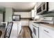 Bright kitchen with white cabinets, stainless steel appliances, and lots of counter space at 16126 Etna Green, Westfield, IN 46074