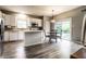 Bright kitchen featuring white cabinets, stainless steel appliances, breakfast nook, and sliding doors to outside at 16126 Etna Green, Westfield, IN 46074