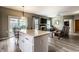 Open concept living room featuring a view of the kitchen and an electric fireplace at 16126 Etna Green, Westfield, IN 46074