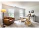 Bright office space with a comfortable chair, desk, and natural light from the windows at 16126 Etna Green, Westfield, IN 46074