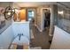 Modern bathroom featuring a soaking tub, dual sinks, a walk-in closet, and stylish finishes, creating a spa-like retreat at 1713 Williamsburg Cir, Franklin, IN 46131