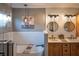 Modern bathroom with a soaking tub, dual sinks, stylish wood cabinets, and updated fixtures, creating a luxurious space at 1713 Williamsburg Cir, Franklin, IN 46131