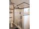 Modern bathroom featuring a glass enclosed shower, white subway tile, and a gray tiled floor at 1713 Williamsburg Cir, Franklin, IN 46131
