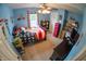 This bedroom features a bed with an American flag styled blanket and sports themed decor at 1713 Williamsburg Cir, Franklin, IN 46131