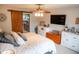 Comfortable bedroom featuring a sliding barn door leading to the bathroom, creating a cozy retreat at 1713 Williamsburg Cir, Franklin, IN 46131
