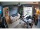 Spacious home office with a comfortable seating area and plenty of natural light at 1713 Williamsburg Cir, Franklin, IN 46131