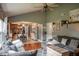 Inviting living room with hardwood floors and an open layout into the dining and kitchen areas at 1713 Williamsburg Cir, Franklin, IN 46131