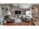 Cozy living room with vaulted ceilings, hardwood floors, and comfortable seating at 1713 Williamsburg Cir, Franklin, IN 46131